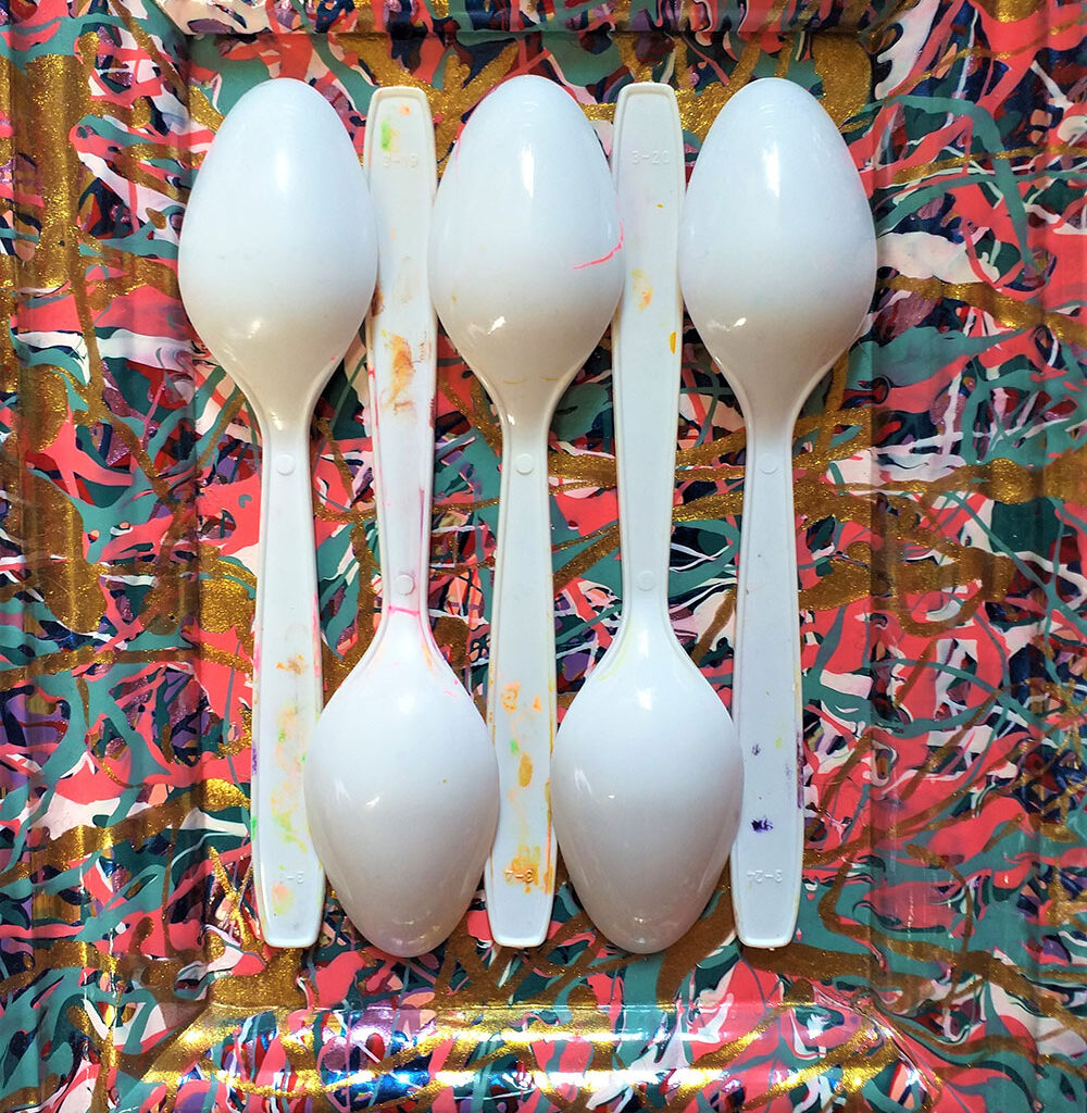 Plastic Spoons on colourful background inspired by spoons in the Holburne Museum collection