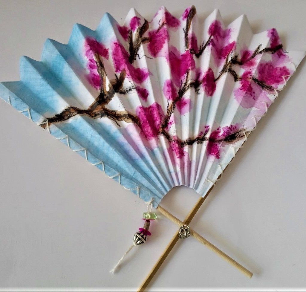 Blue and white paper fan with tree design. Inspired by fans in the Holburne Museum collection