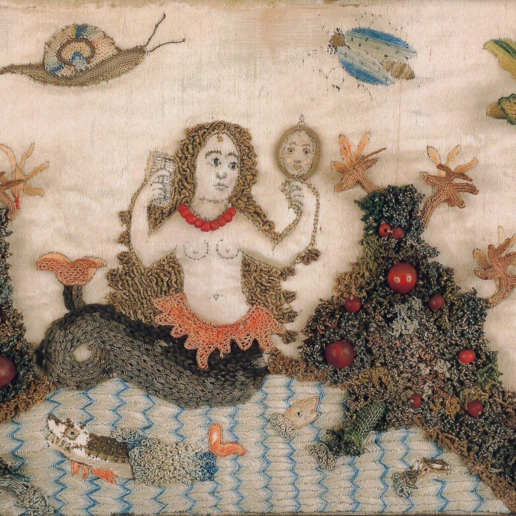 Raised embroidery depicting a mermaid